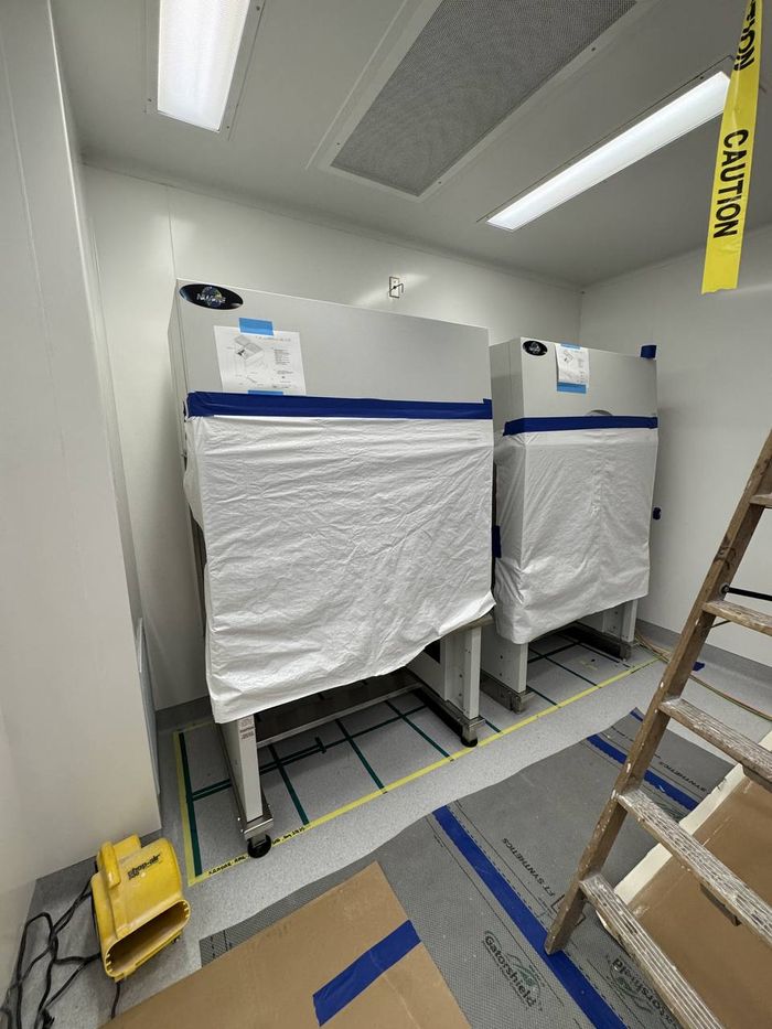 Laminar flow workstation during install and commissioning in a pharmacy