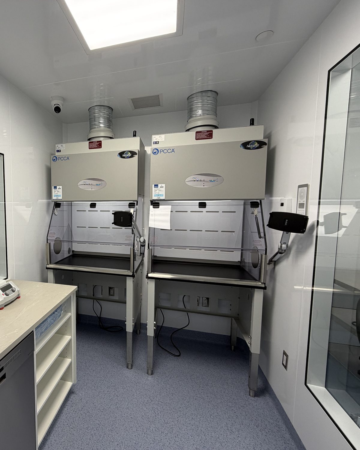 Two containment ventilated enclosures installed side by side in a non-sterile hazardous compounding room